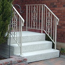 Red brick house with unit steps.