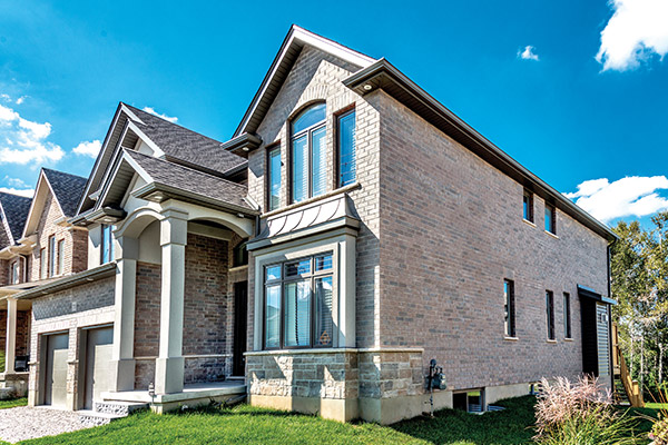 Light coloured brick home.