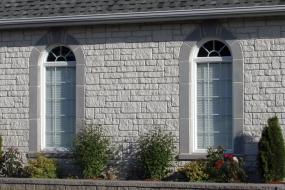 Shouldice Designer Stone - Windows with Roman surrounds