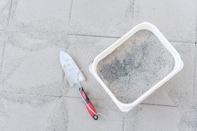 refreshing polymeric sand on pavers