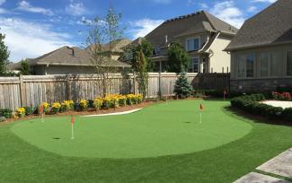 Artificial putting green in backyard